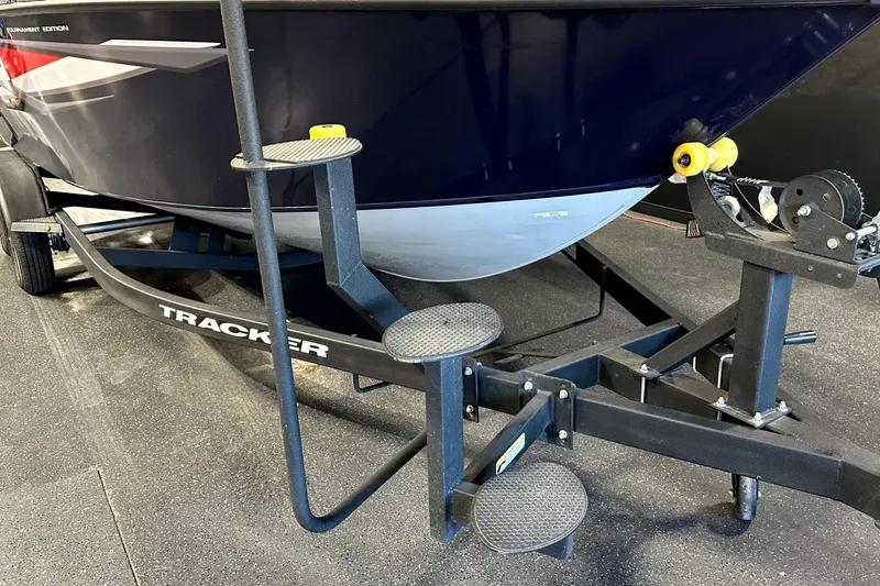 Slide: The Image of 2025 Tracker Targa V-19 WT boat on trailer with step ladder and winch system. - 6