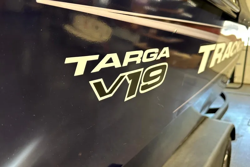 Slide: The Image of 2025 Tracker Targa V-19 WT boat side view with logo. - 9