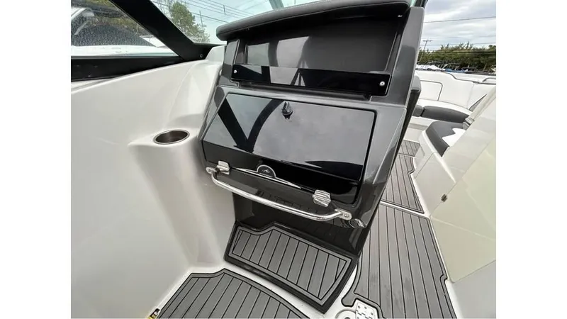 Slide: The Image of 2018 Monterey M65 boat interior with sleek dashboard and modern design. - 15