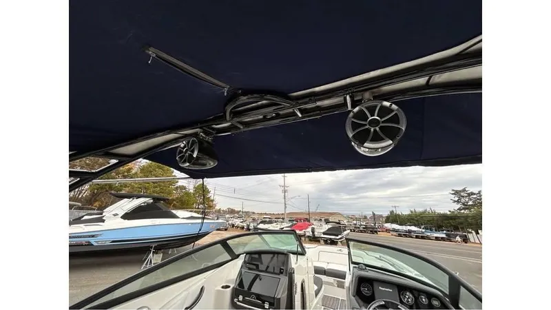 Slide: The Image of 2018 Monterey M65 boat interior with speakers and dashboard view. - 21