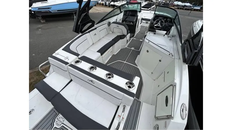 Slide: The Image of 2018 Monterey M65 boat interior with white seating and sleek design. - 5