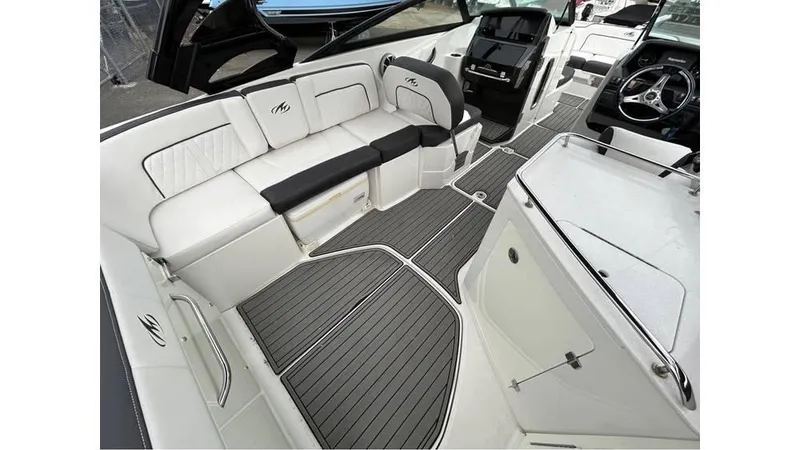 Slide: The Image of 2018 Monterey M65 boat interior with sleek seating and modern design. - 6