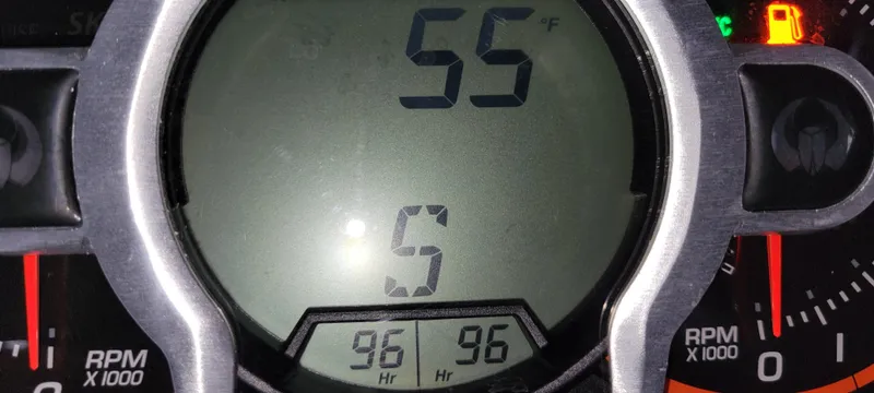 Slide: The Image of Digital dashboard of a 2021 Scarab 215 ID showing 55°F and 96 hours. - 18