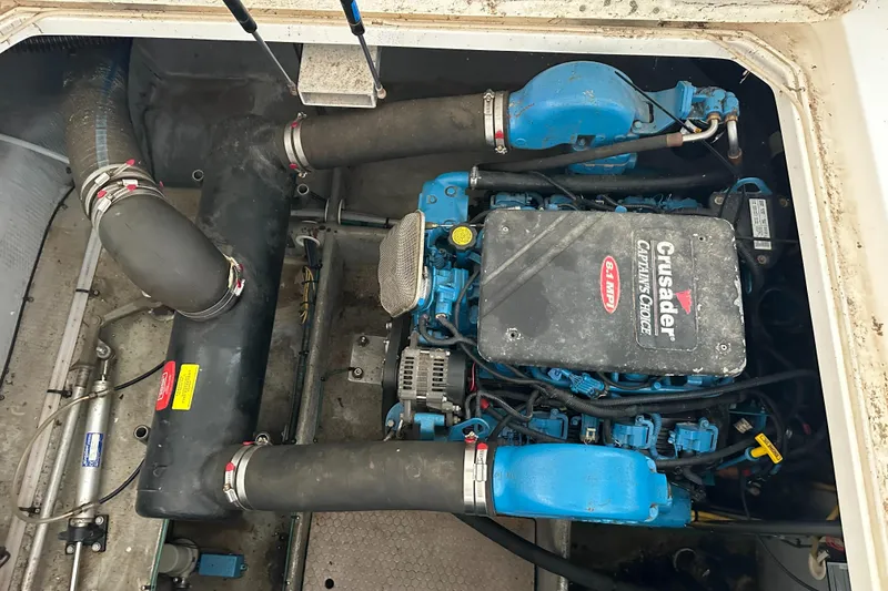 Slide: The Image of Engine compartment of a 2002 Silverton 35 Convertible boat with Crusader engine. - 33