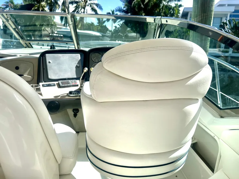 Slide: The Image of Interior view of 2005 Sea Ray 420 Sundancer yacht with white leather seating. - 20