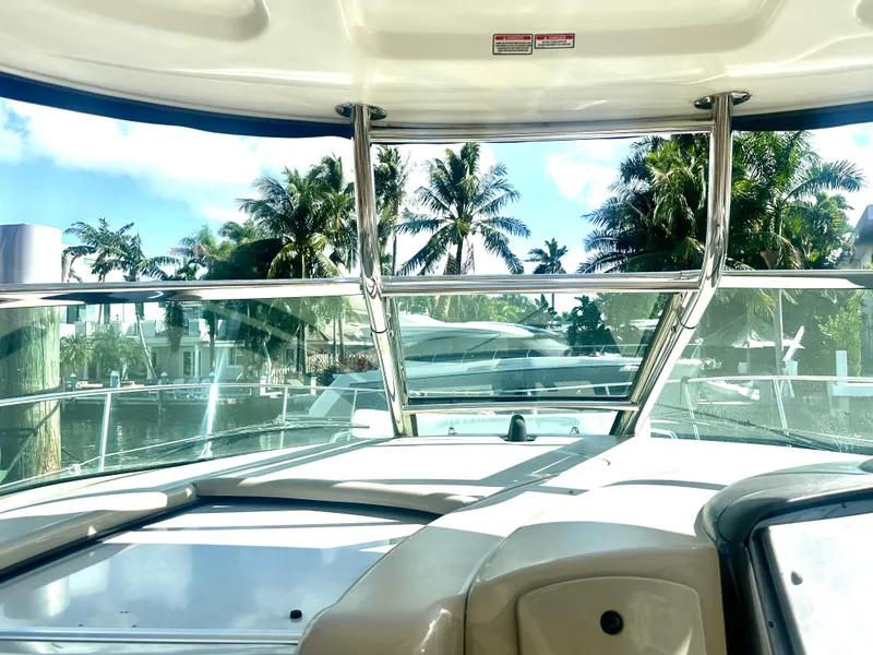 Slide: The Image of View from 2005 Sea Ray 420 Sundancer yacht, overlooking marina and palm trees. - 27
