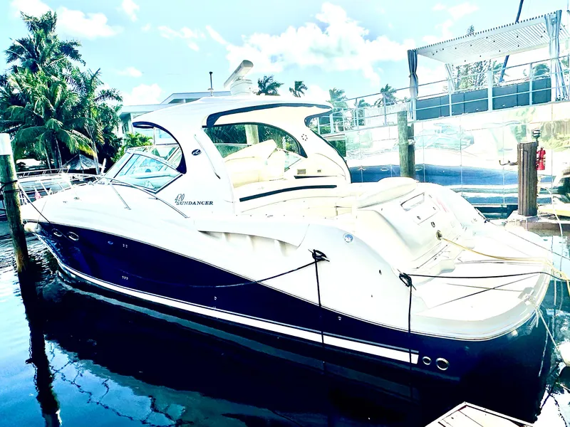 Slide: The Image of 2005 Sea Ray 420 Sundancer yacht docked in sunny marina. - 3