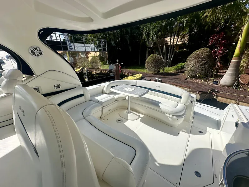Slide: The Image of Luxurious 2005 Sea Ray 420 Sundancer yacht interior with elegant seating and table. - 32