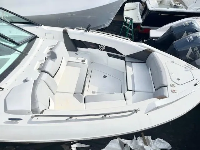 Slide: The Image of 2016 Cruisers Sport Series 328CX boat with spacious seating and modern design. - 8