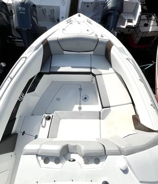 Slide: The Image of 2016 Cruisers Sport Series 328CX boat interior with spacious seating and modern design. - 9