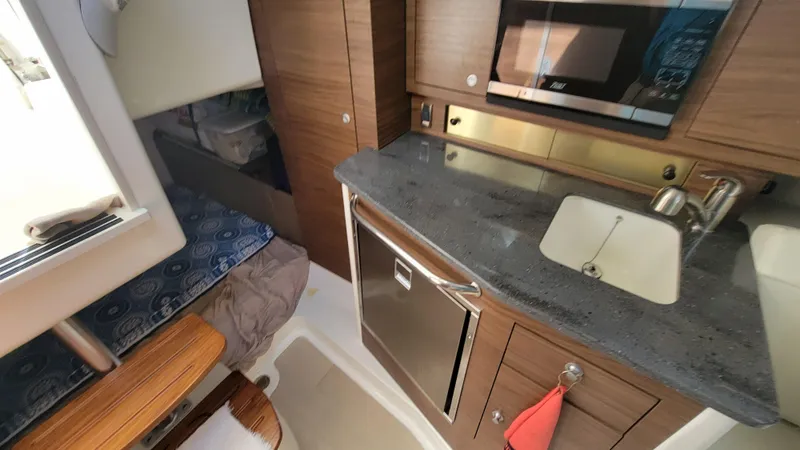 Slide: The Image of Boston Whaler 325 Conquest 2023 - 62