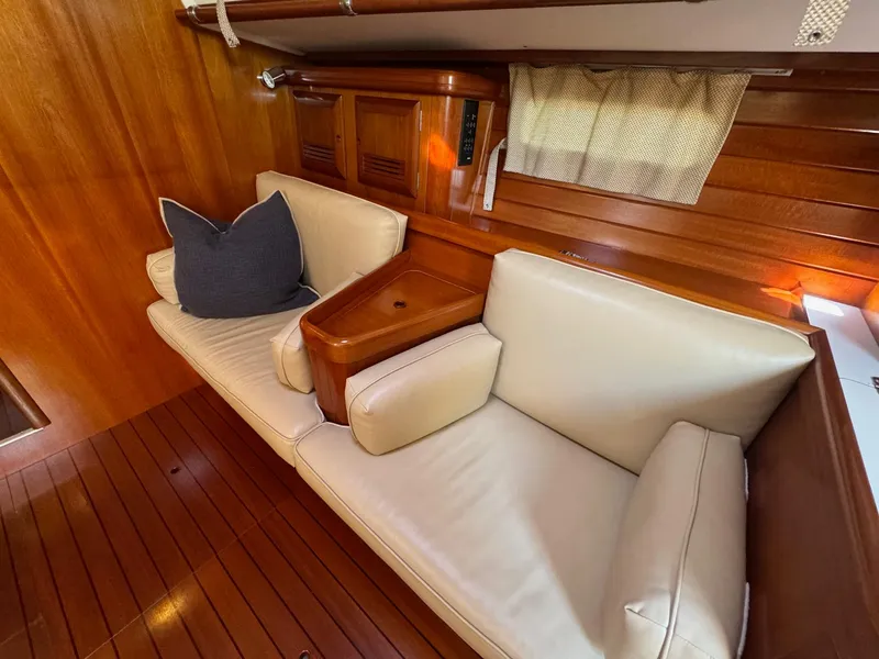 Slide: The Image of Luxurious interior of 2002 Beneteau 50 yacht with cream leather seating. - 28