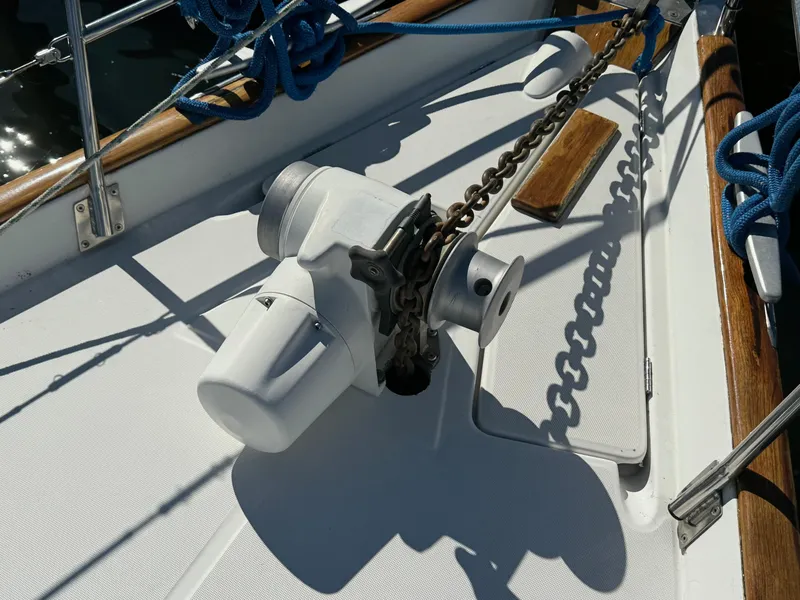 Slide: The Image of Anchor windlass on 2002 Beneteau 50 sailboat deck with chain and ropes. - 41