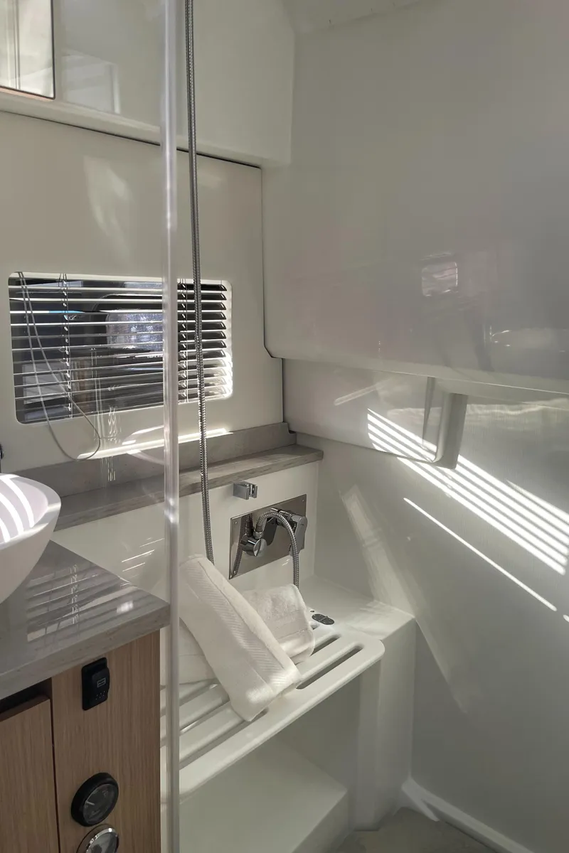 Slide: The Image of 2025 Jeanneau Leader 12.5 WA bathroom interior with modern fixtures and sleek design. - 20