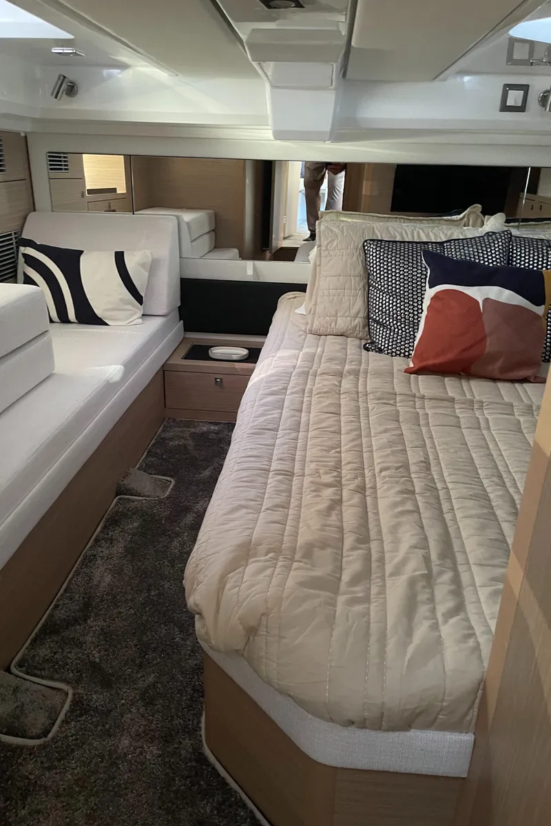 Slide: The Image of Luxurious interior of 2025 Jeanneau Leader 12.5 WA with cozy bedding and modern design. - 21