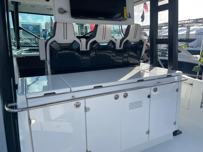 Slide: The Image of 2025 Jeanneau Leader 12.5 WA boat interior with sleek seating and modern design. - 5