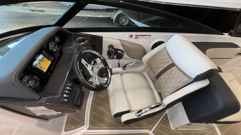 Slide: The Image of Luxurious 2025 Monterey M65 boat interior with modern dashboard and plush seating. - 19