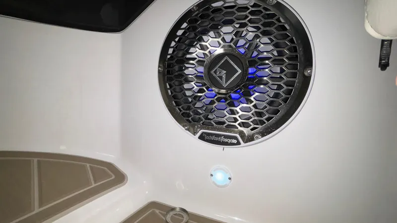 Slide: The Image of Monterey M65 2025 boat speaker with blue LED lighting. - 31