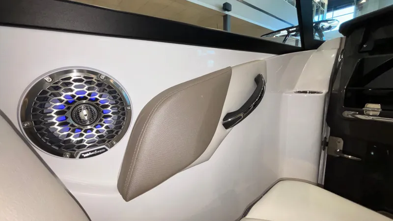 Slide: The Image of Interior of 2025 Monterey M65 boat with speaker and sleek design. - 32