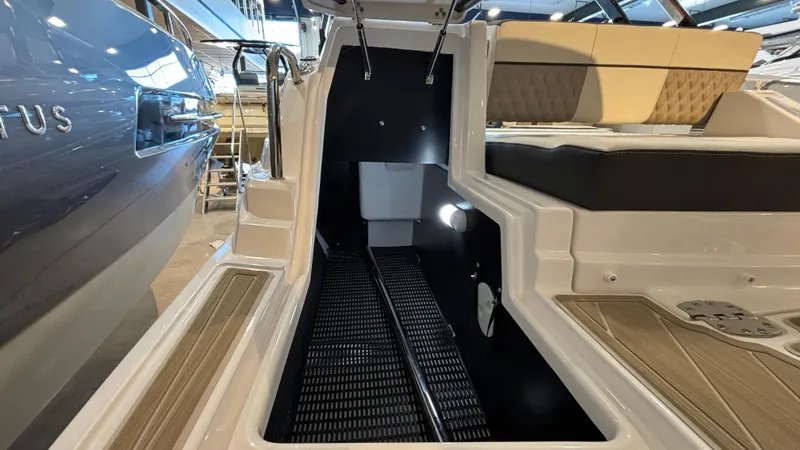 Slide: The Image of 2025 Monterey M65 boat interior with sleek seating and modern design. - 36