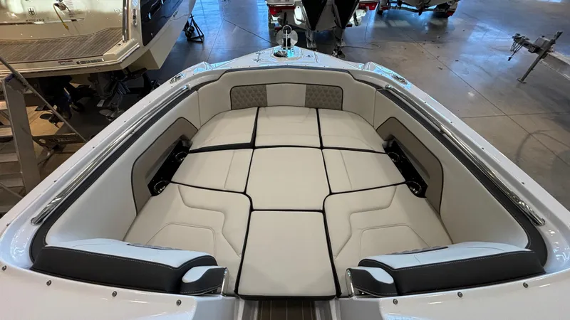 Slide: The Image of 2025 Monterey M65 boat interior with spacious seating and modern design. - 44