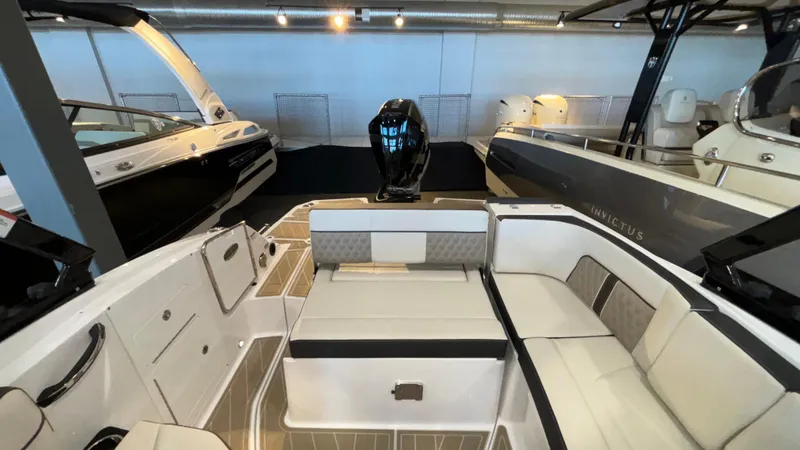 Slide: The Image of Interior view of a 2025 Monterey M65 boat, featuring sleek seating and modern design. - 5