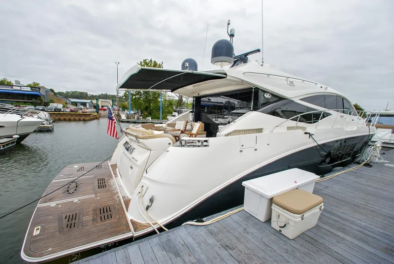 Slide: The Image of Luxury 2016 Sea Ray L650 yacht docked at marina. - 17