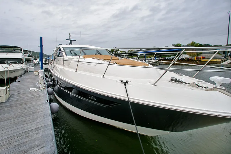 Slide: The Image of 2016 Sea Ray L650 luxury yacht docked at marina. - 18