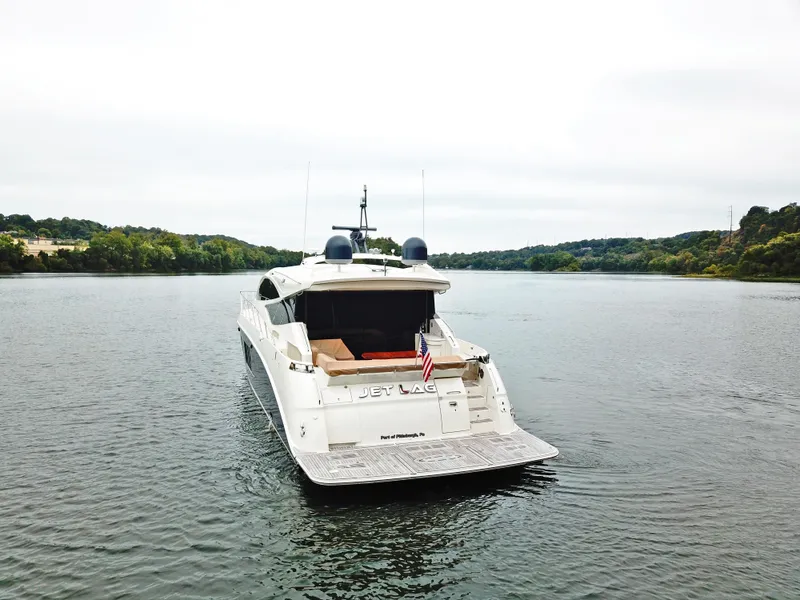 Slide: The Image of 2016 Sea Ray L650 yacht cruising on a serene lake. - 3