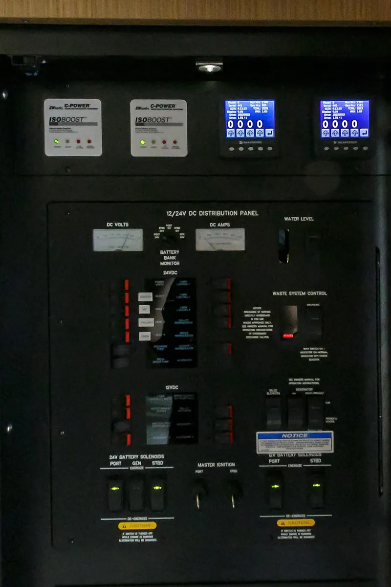 Slide: The Image of Control panel of 2016 Sea Ray L650 yacht, featuring various switches and digital displays. - 31