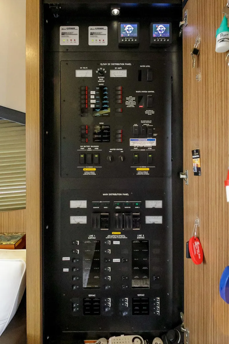 Slide: The Image of Electrical control panel on a 2016 Sea Ray L650 yacht. - 32