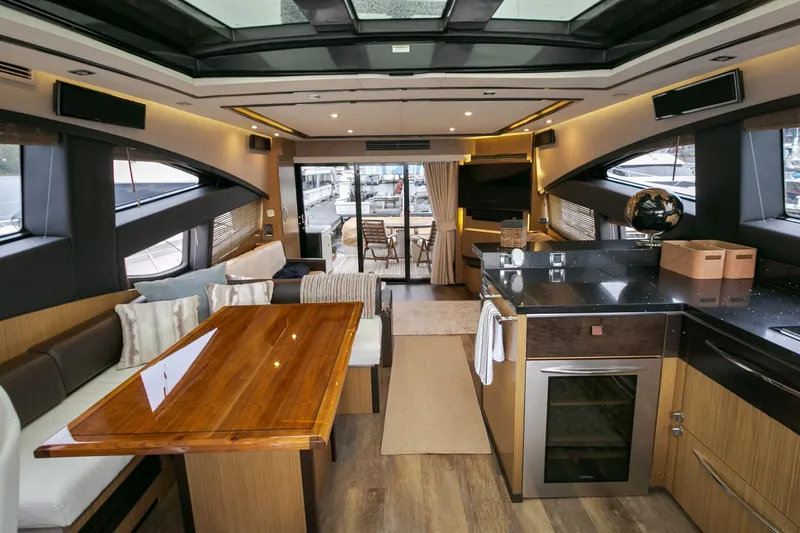 Slide: The Image of Luxurious interior of 2016 Sea Ray L650 yacht with modern furnishings and elegant design. - 37