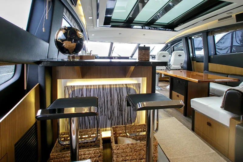 Slide: The Image of Luxurious interior of 2016 Sea Ray L650 yacht with modern seating and elegant decor. - 41