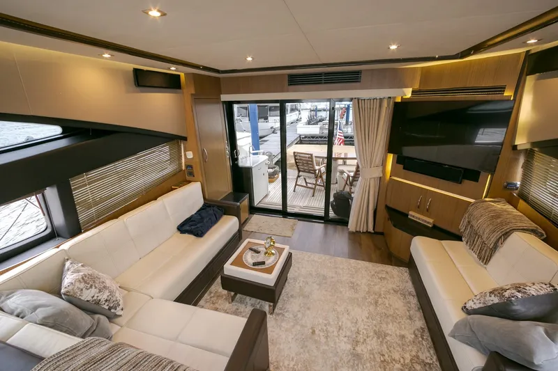 Slide: The Image of Luxurious interior of 2016 Sea Ray L650 yacht with elegant seating and modern decor. - 43