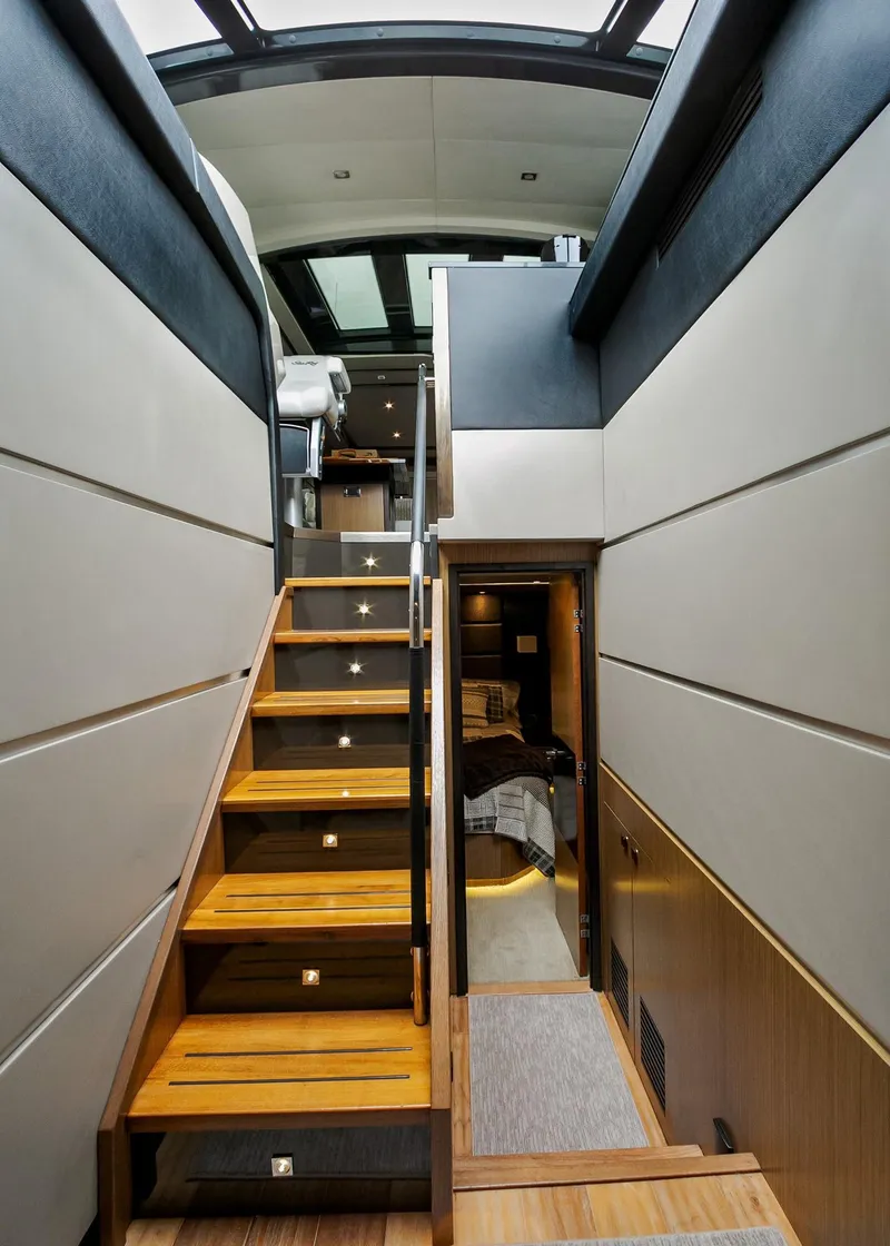 Slide: The Image of Interior of 2016 Sea Ray L650 yacht with modern staircase and luxurious design. - 46