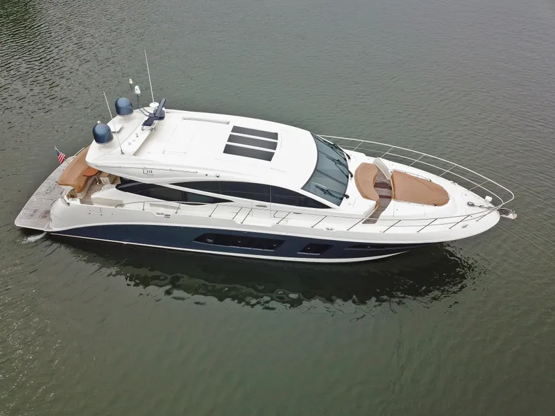 Slide: The Image of 2016 Sea Ray L650 luxury yacht on calm water. - 7