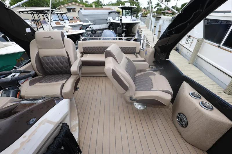 Slide: The Image of 2019 Bennington R 23 RSBA boat interior with plush seating and modern design. - 12