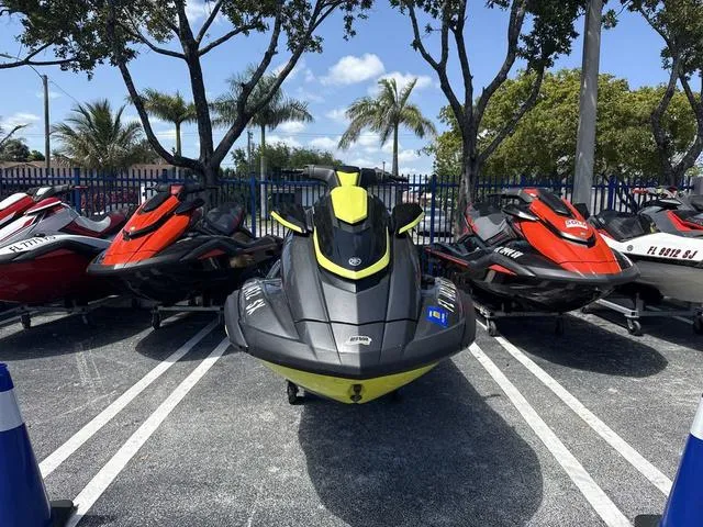 Slide: The Image of 2021 Yamaha WaveRunner FX SVHO jet ski parked outdoors with palm trees in the background. - 4