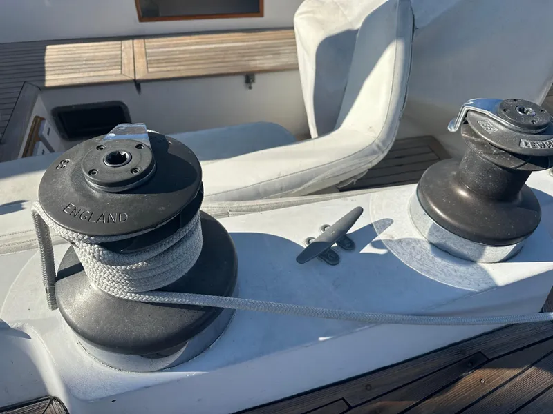 Slide: The Image of Close-up of winches and cleat on 1980 Skye 51 Ketch sailboat deck. - 14