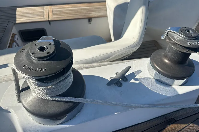 Slide: The Image of Close-up of winches and rope on a 1980 Skye 51 Ketch sailboat deck. - 17