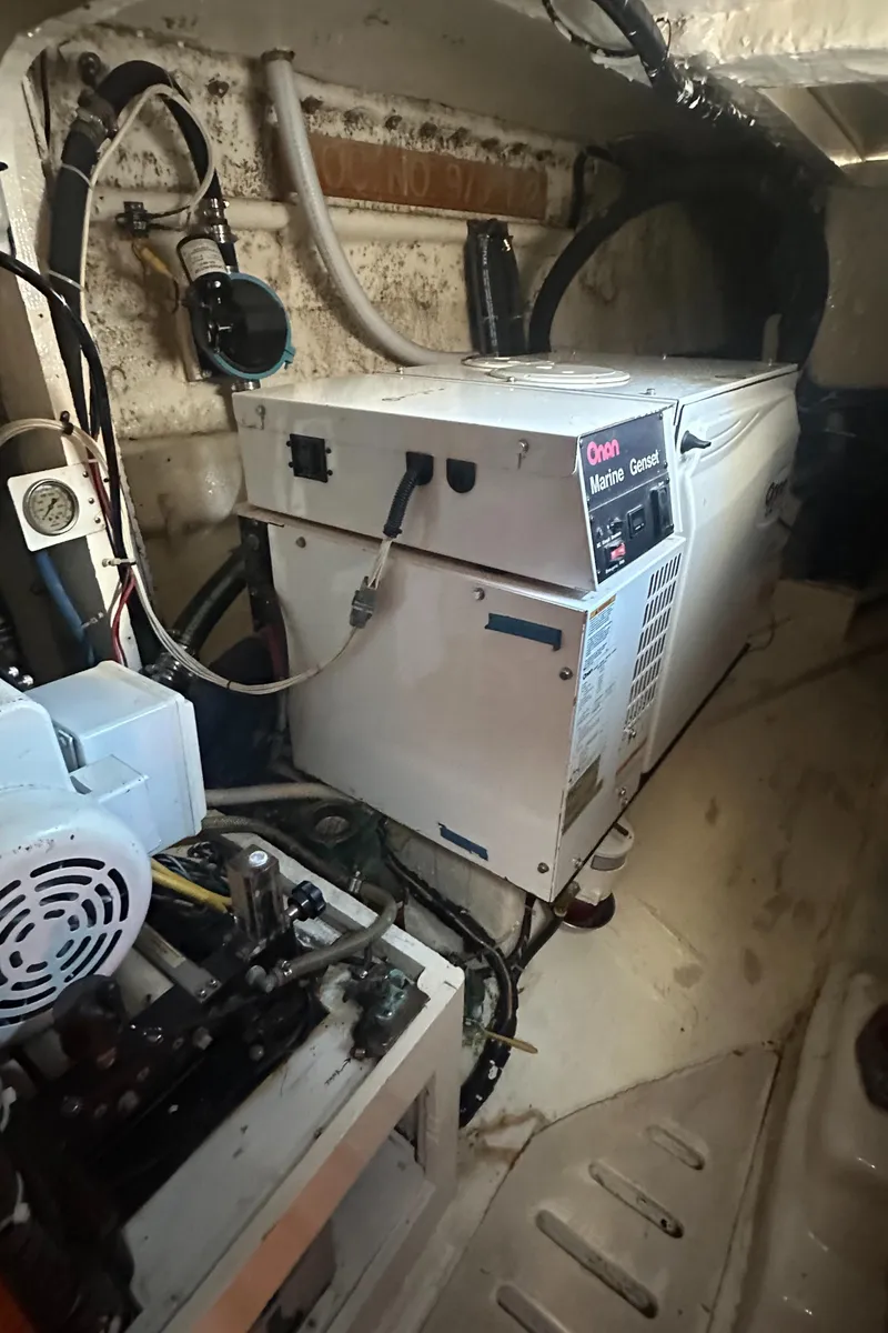 Slide: The Image of Engine room of 1980 Skye 51 Ketch sailboat with Onan marine generator. - 32