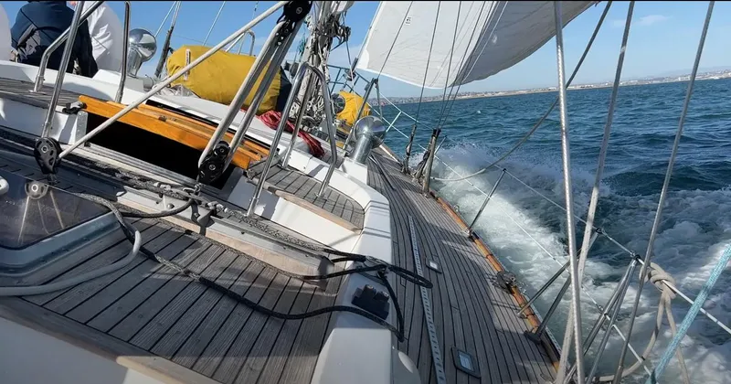 Slide: The Image of Sailboat Skye 51 Ketch Kaufman & Ladd 1980 navigating ocean waves. - 42