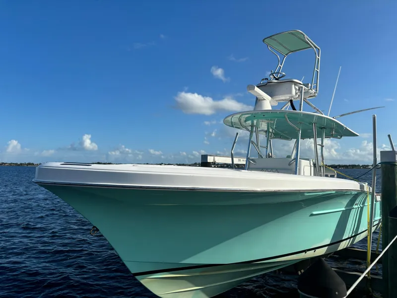 Slide: The Image of 2006 Buddy Davis 34 Center Console boat docked on a sunny day. - 5