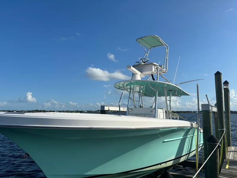 Slide: The Image of 2006 Buddy Davis 34 Center Console boat docked on a sunny day. - 6