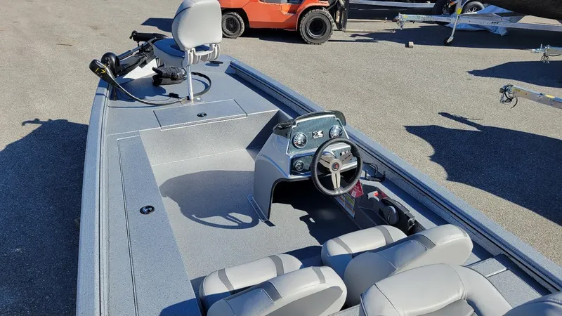 Slide: The Image of 2025 Xpress XP180 Bass boat with Yamaha F25 hp engine, featuring sleek interior design. - 3