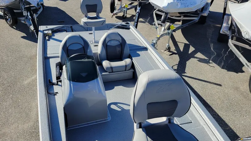 Slide: The Image of 2025 Xpress XP180 Bass boat with Yamaha F25 hp engine, featuring comfortable seating. - 4