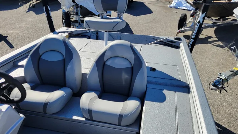 Slide: The Image of 2025 Xpress XP180 Bass boat interior with dual seats, featuring Yamaha F25 hp engine. - 5