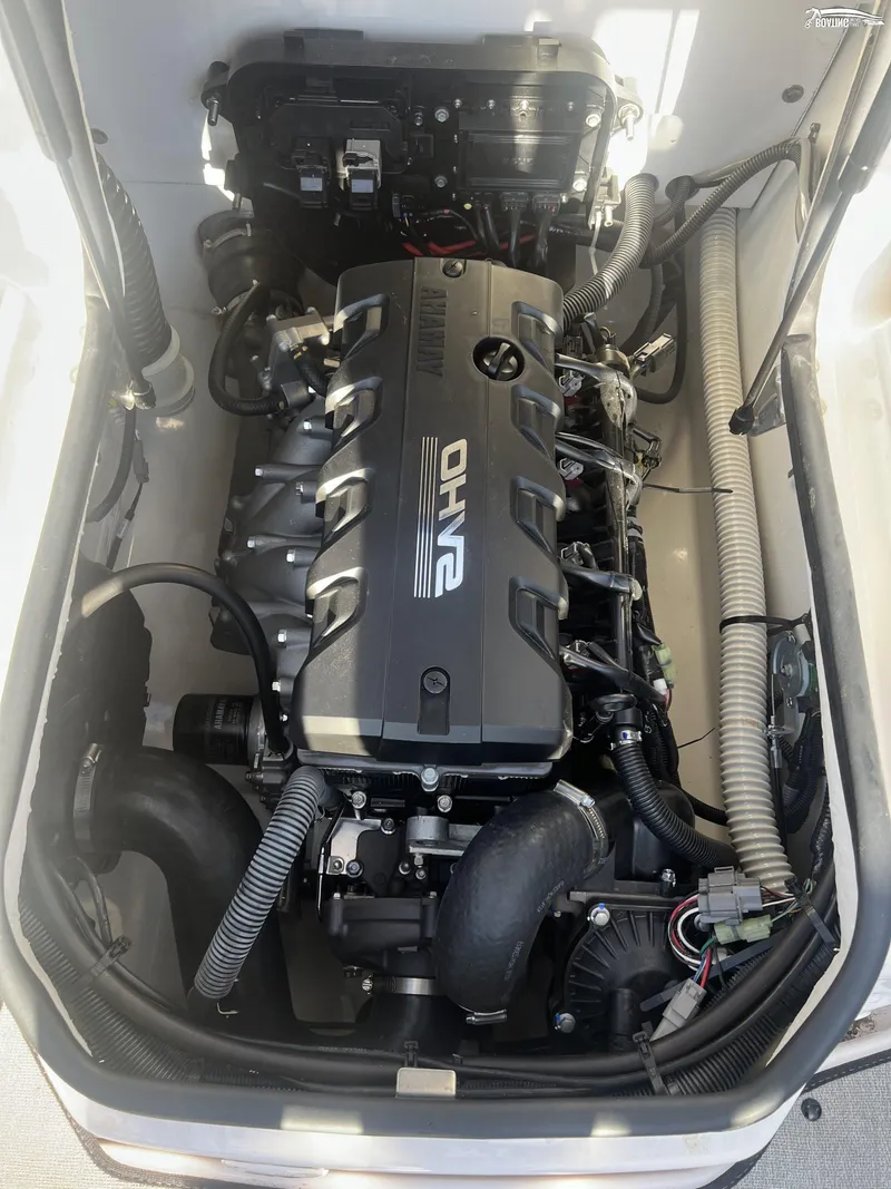 Slide: The Image of 2024 Yamaha AR195 boat engine compartment, showcasing powerful SRHO engine design. - 10