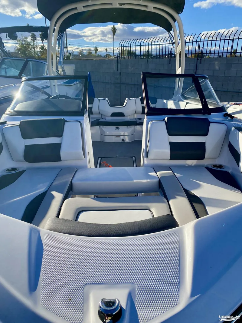 Slide: The Image of 2024 Yamaha Boats AR195 interior with sleek seating and modern design. - 8