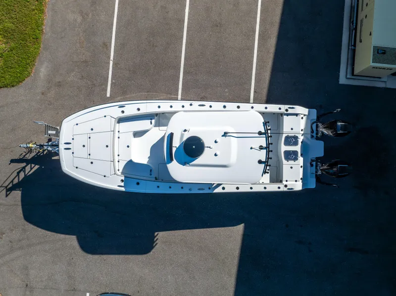 Slide: The Image of Aerial view of 2024 Freeman 28 boat on trailer in parking lot. - 10